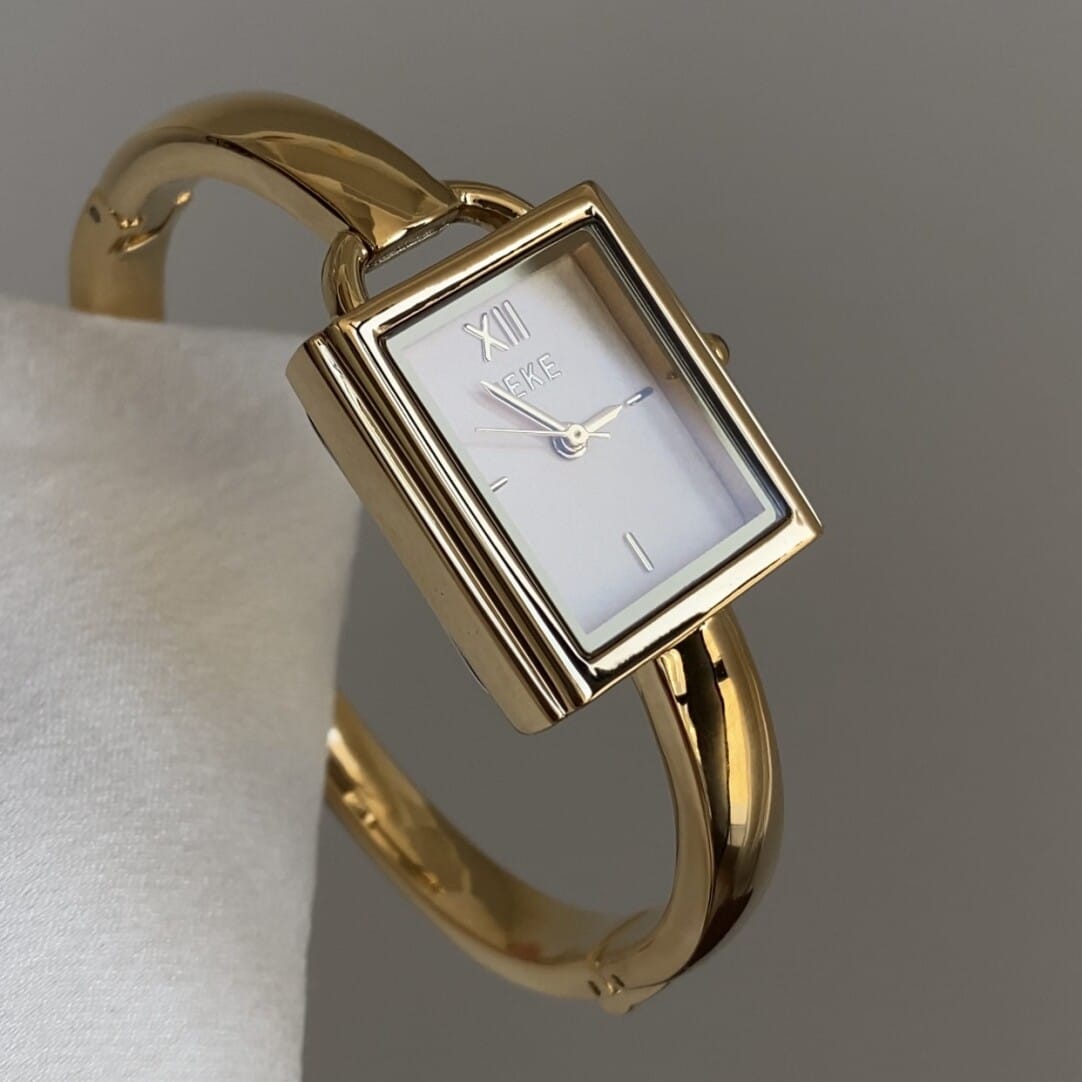 Elegant Gold-Tone Bangle Watch – Minimalist Dial, Adjustable Bracelet, Stainless Steel & Crystal Accents