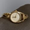 Elegant Gold-Tone Bangle Watch – Minimalist Dial, Adjustable Bracelet, Stainless Steel & Crystal Accents