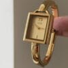 Elegant Gold-Tone Bangle Watch – Minimalist Dial, Adjustable Bracelet, Stainless Steel & Crystal Accents