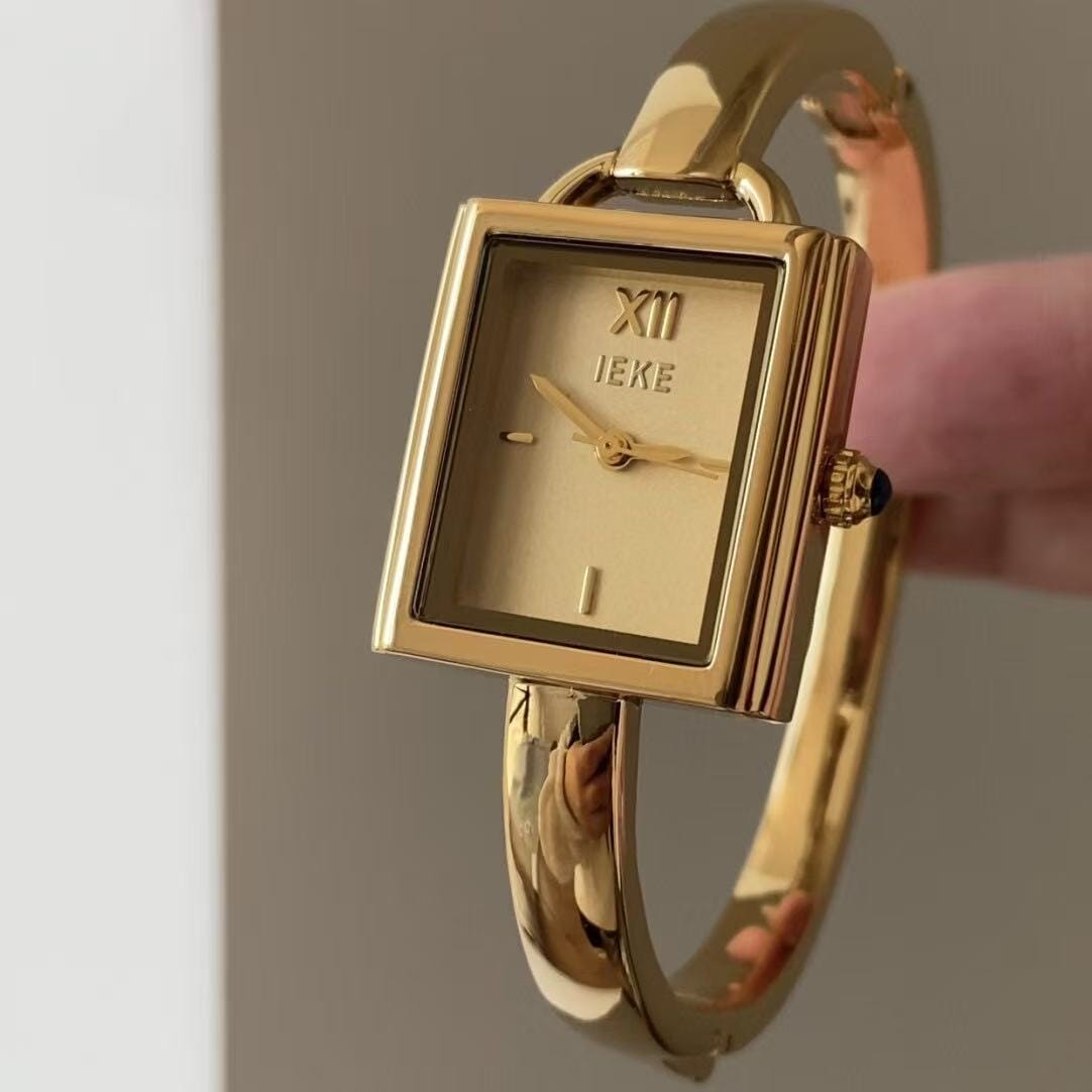 Elegant Gold-Tone Bangle Watch – Minimalist Dial, Adjustable Bracelet, Stainless Steel & Crystal Accents