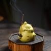 Zisha Clay Cat Tea Pet Holding Mini Teapot - Handmade Yixing Disha Clay Sculpture & Incense Holder