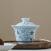微信图片_20260131202147_1615_6 Hand-Painted Relief Carving Ceramic Gaiwan Set - Artistic Tea Set with Saucer