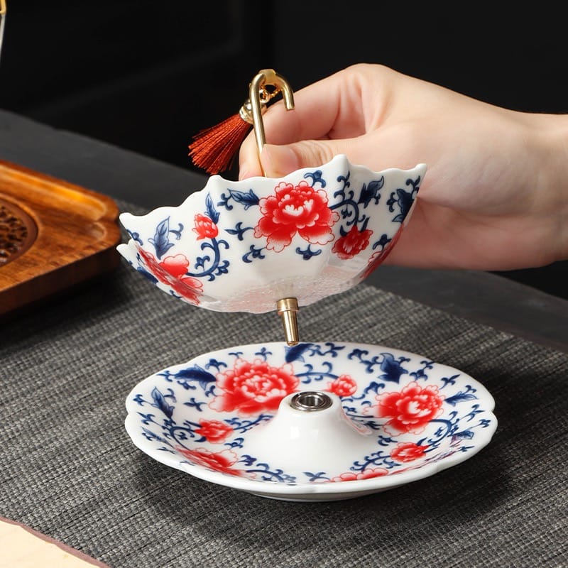 Blue and White Rotating Tea Strainer: Your Free Elegant Ceramic Infuser with Any Tea Order!