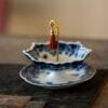 Blue and White Rotating Tea Strainer: Your Free Elegant Ceramic Infuser with Any Tea Order!